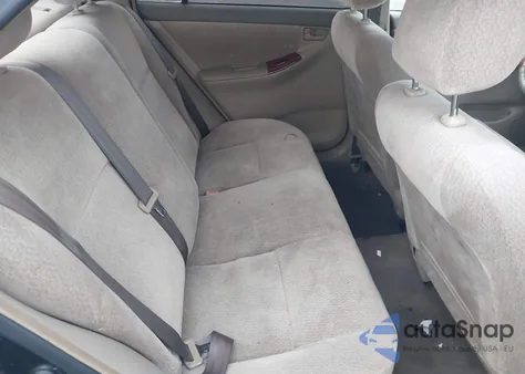 2003 Toyota Corolla Ce/Le z USA, uszkodzony, nr VIN JTDBR32E130024045